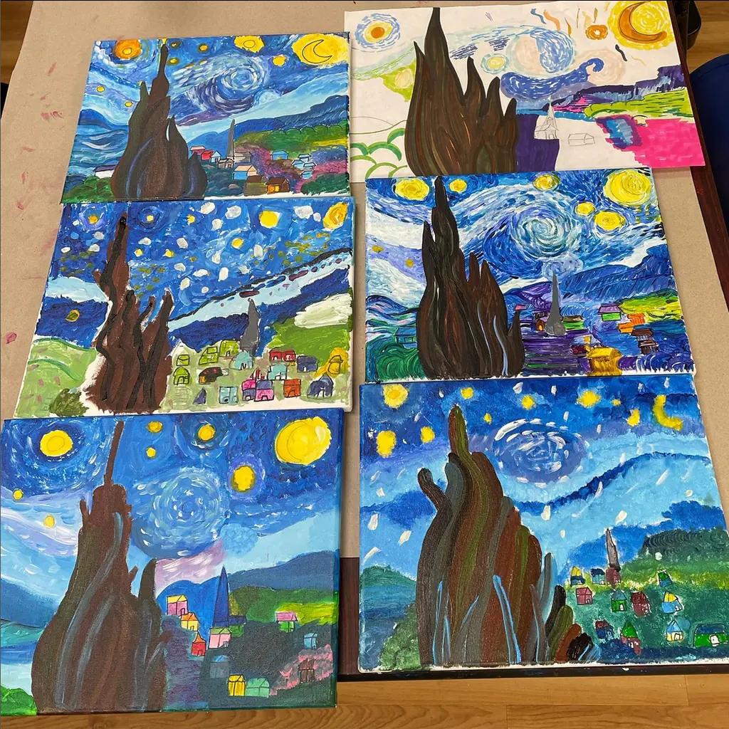 Student versions of Starry Night laid out to dry